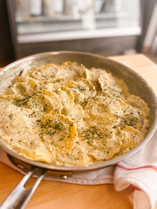 Spinach & Cheese Ravioli with Pesto Cream Sauce